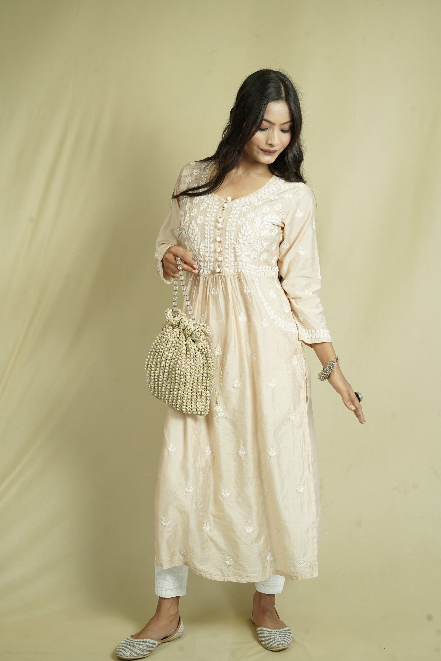 Chanderi Chikankari long kurti with pockets.